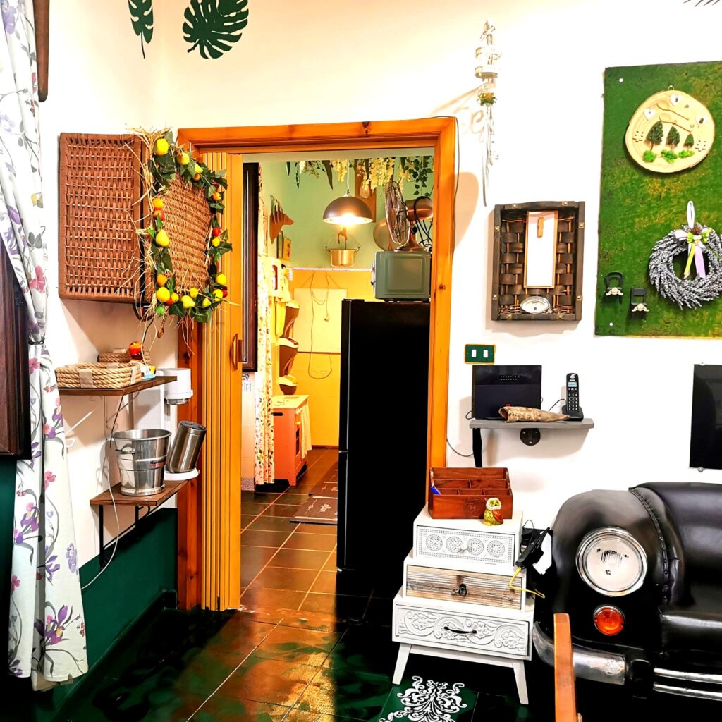 Example of eclectic interior design with unique and upcycled art pieces